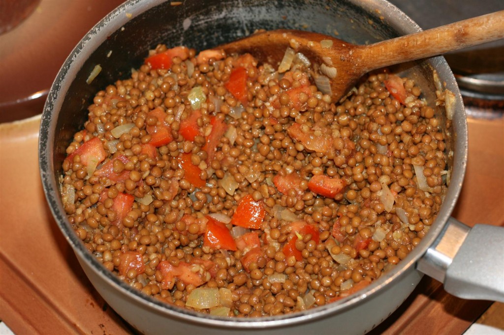 Lentils mixed with tomatoes and onion