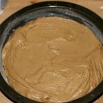 Cake mix spread in the tin