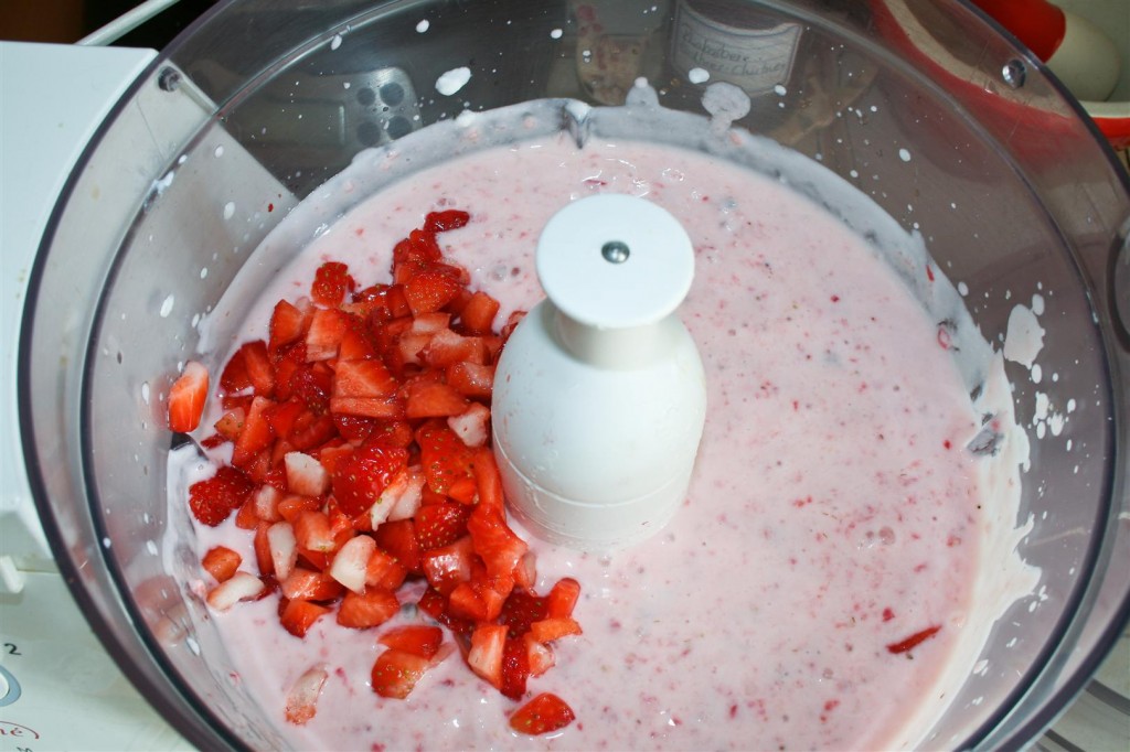 Mixing in the strawberry chunks